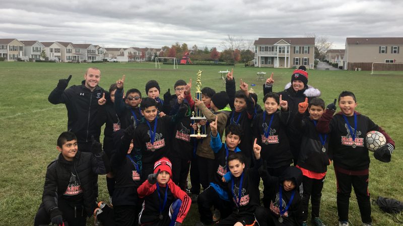 5th grade boys celebrate their tournament win on October 28, 2017.