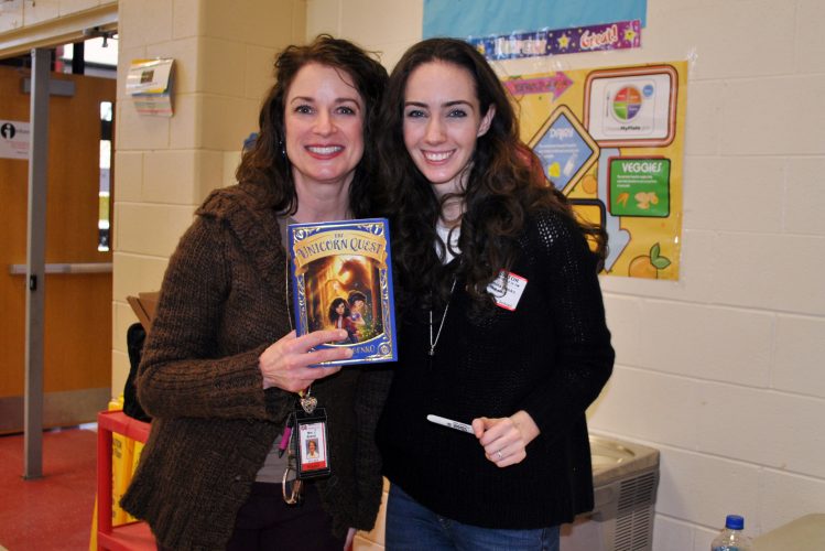 Author Kamilla Benko poses with 4th grade teacher, Mrs. Brandt.