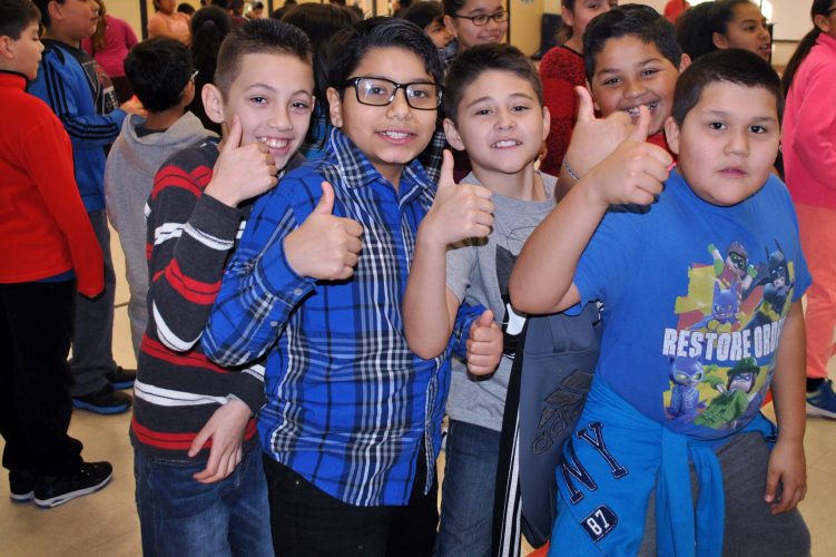 4th grade students give a big "thumbs up" for author Kamilla Benko!