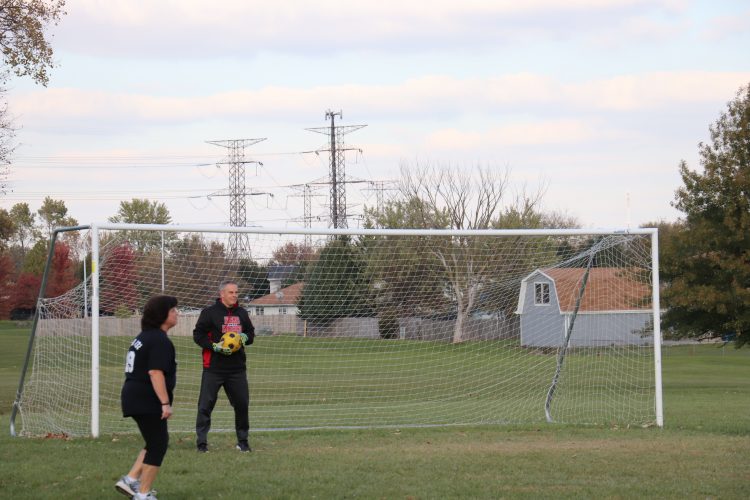 Fearless leader and goalie, Mr. Dart, stops a goal.