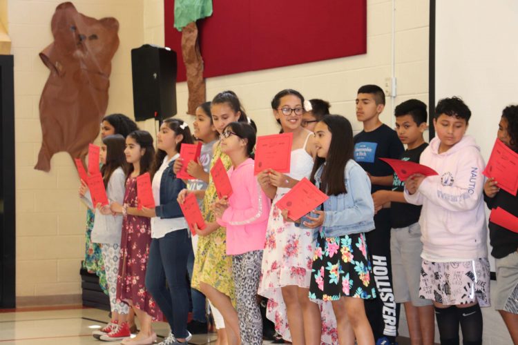 5th graders receive awards for athletics.