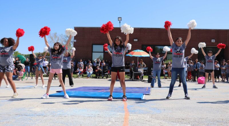 5th grade cheerleaders perform.