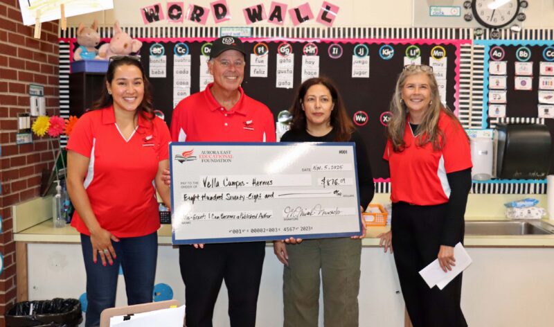 Ms. Campos posed with AEEF members after she was presented a check to support writing projects in 2nd grade.